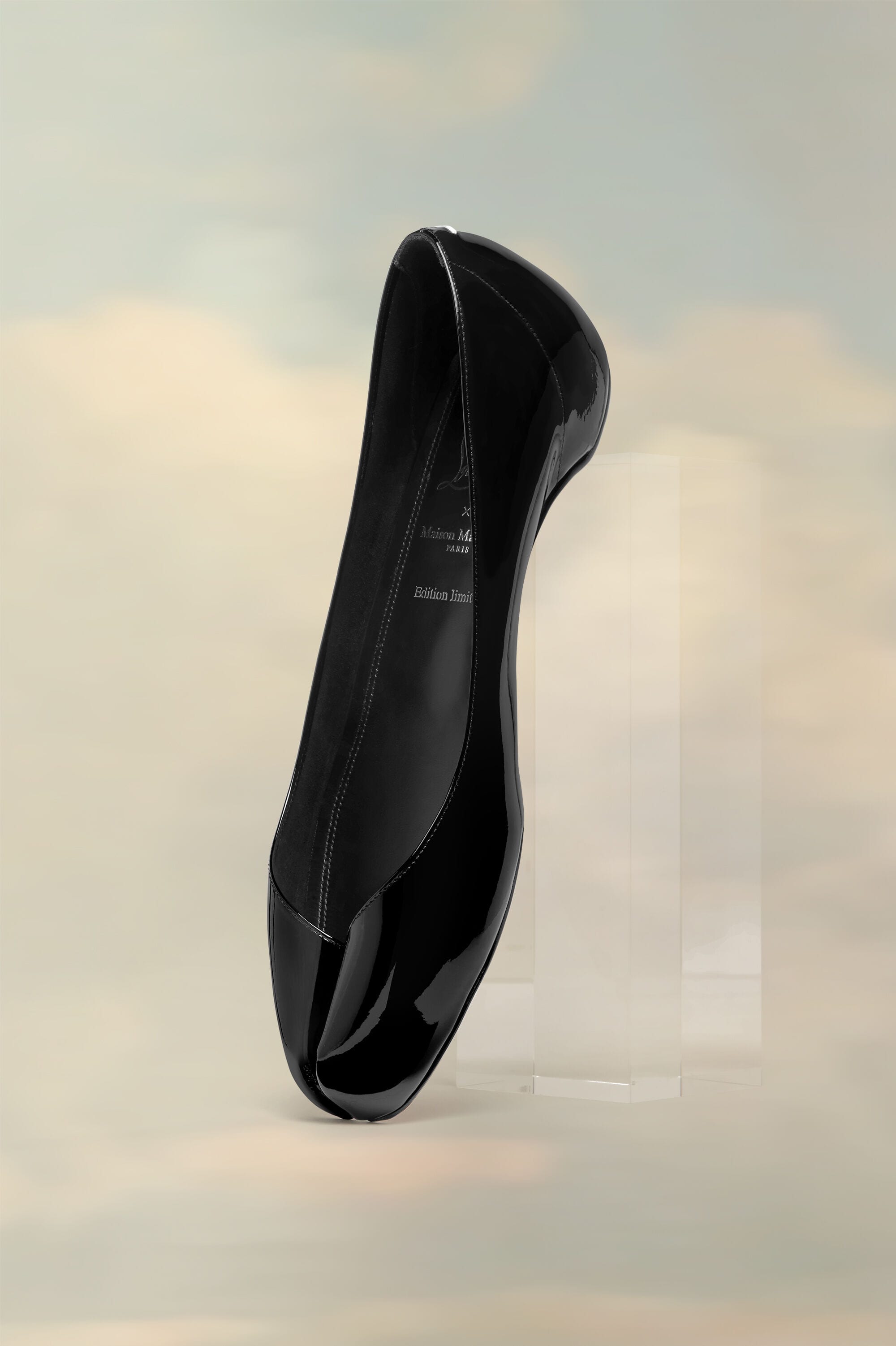 Marlougiela Black, €945 (approximately P62,795.25), MAISON MARGIELA X CHRISTIAN LOUBOUTIN, eu.christianlouboutin.com